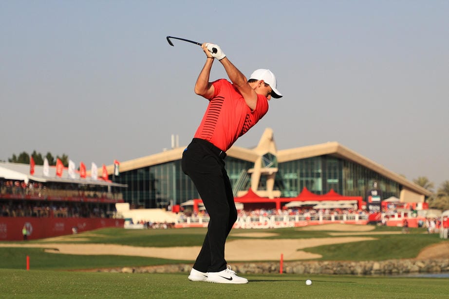 65’s move Dunne and McIlroy into Abu Dhabi contention