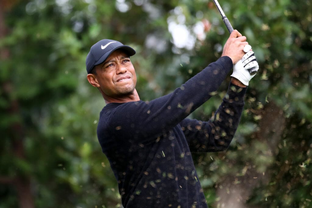 Woods roars into lead at ZoZo Championship as McIlroy struggles