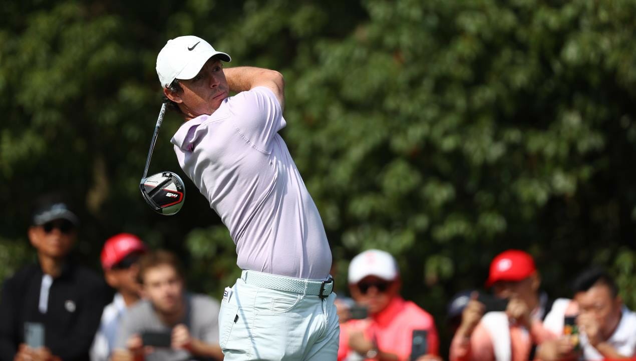 Mighty McIlroy moves to the front in Shanghai