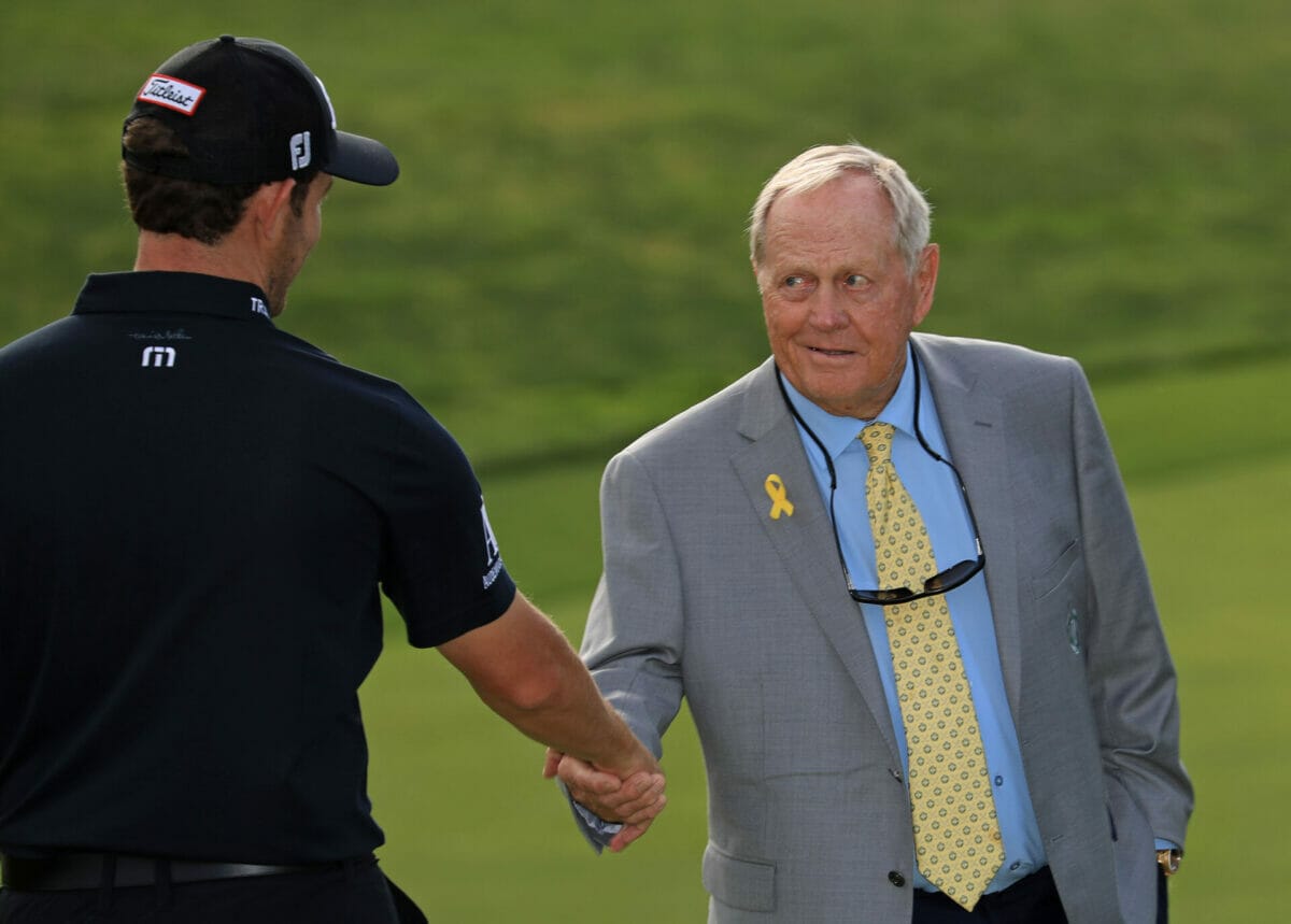 Nicklaus has his right hand outstretched, what do you do?