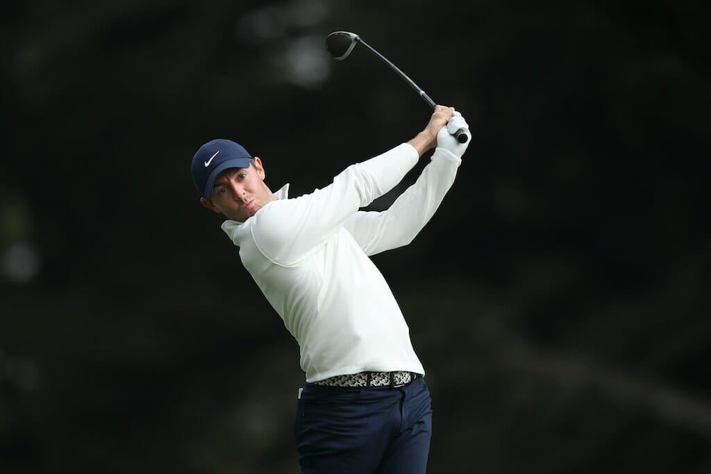 McIlroy leads by example with act of class in round two