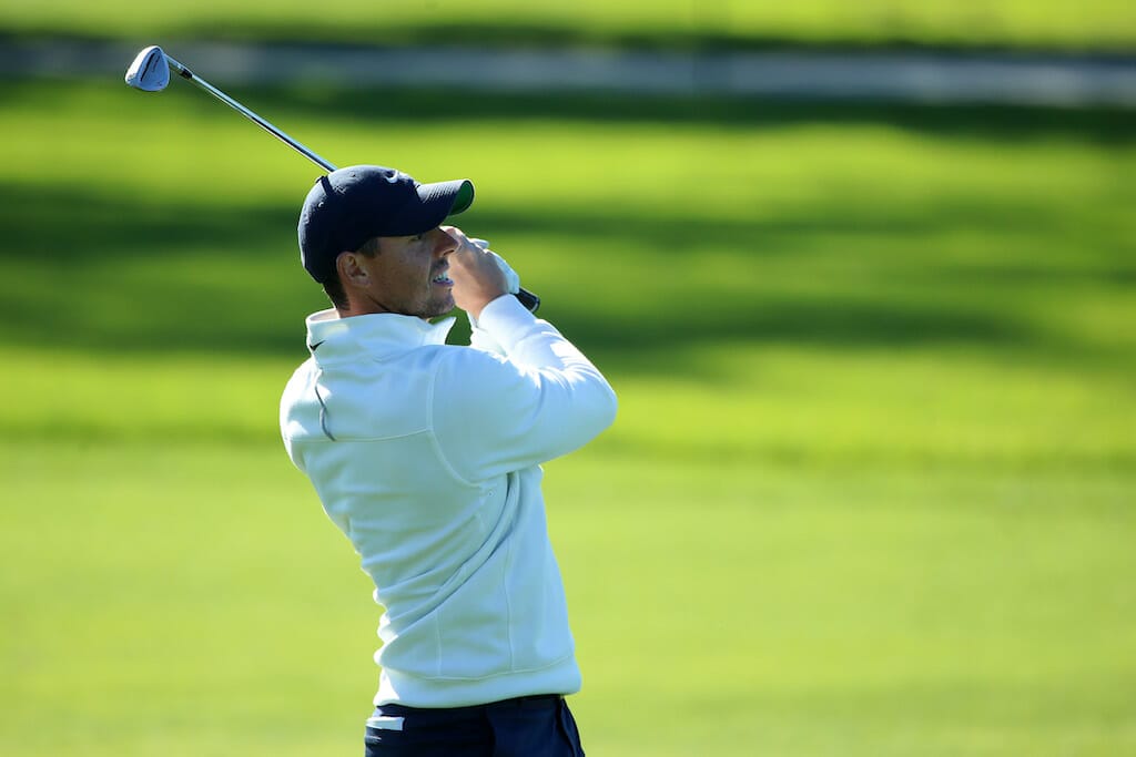 McIlroy simmering just three back ahead of Farmers finale