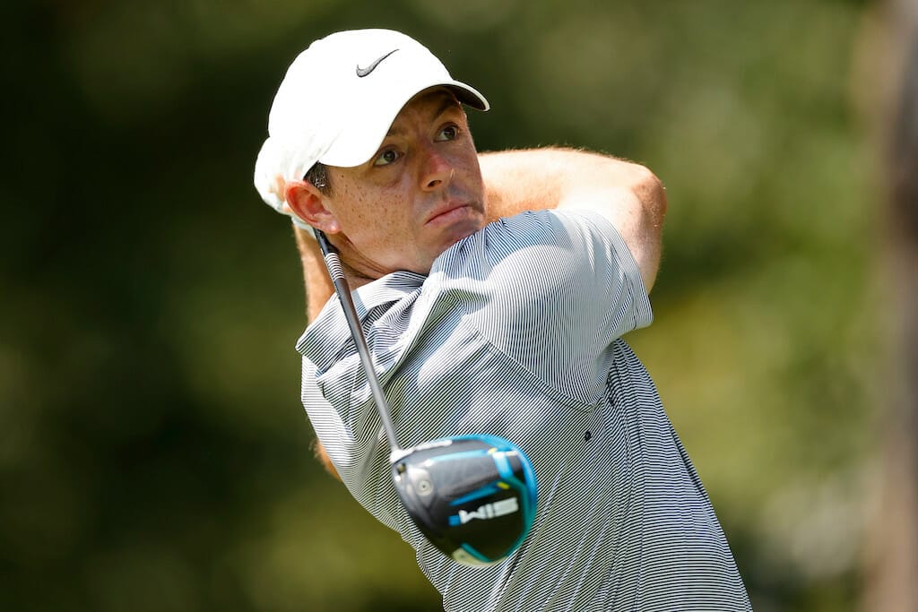 McIlroy dusts off old gear to drive his way to BMW lead