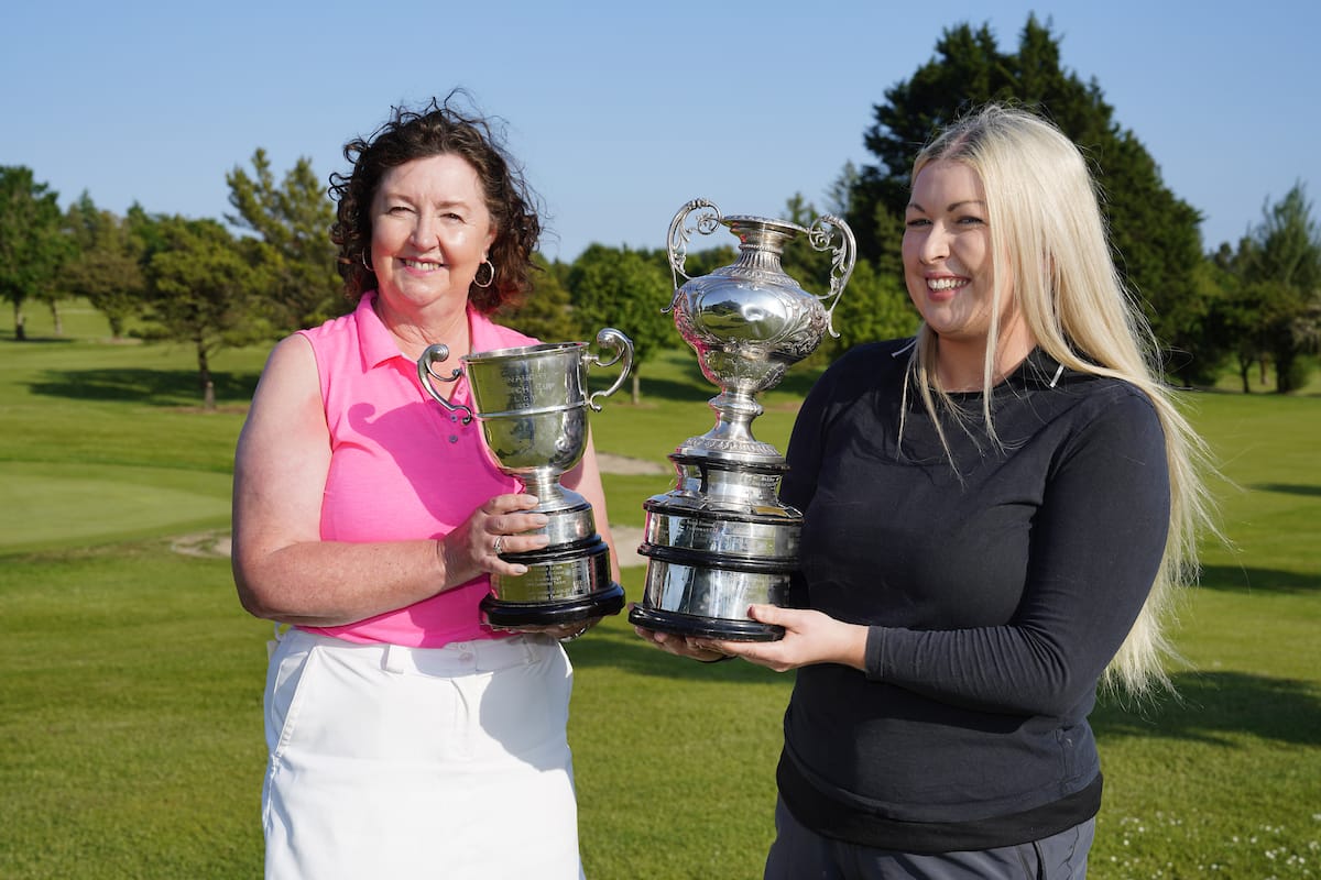 Suzanne Corcoran (left) and Louise Butler celebrate their wins in Loughrea. Photo: Fran Caffrey / Golffile